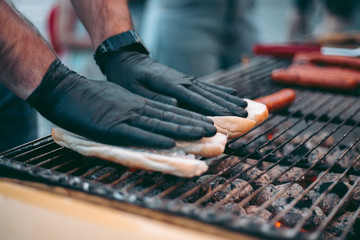 Delicious fresh hot dogs on the grill