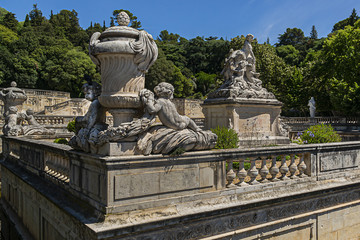 Fototapeta na wymiar Remarkable garden and first public garden in Europe: Jardin de la Fontaine (1738 - 1755) in Nimes. Nimes, Occitanie region of southern France.