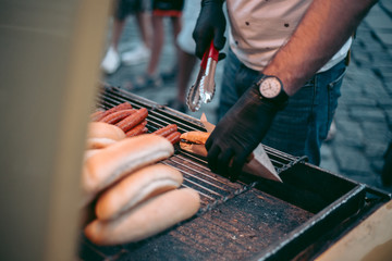Delicious fresh hot dogs on the grill