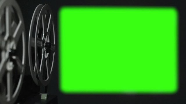 Cinema projector shows green screen