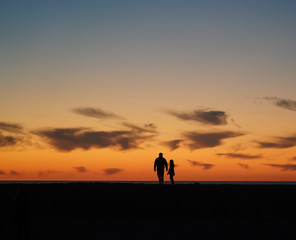 Silhouette Sunset with Father Daughter