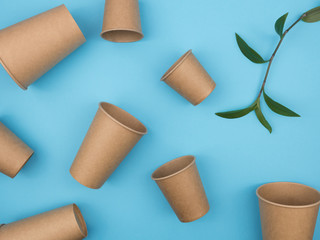 Environmental dishware on a blue background.