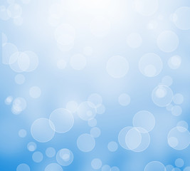 Abstract bokeh blue color background. Christmas bokeh lights refocused blurred background