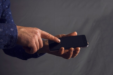 man holds the phone