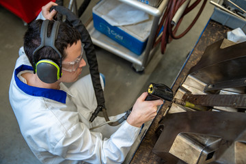 the engineer performs freezing of the casting using a special machine. maintenance of metal molds...