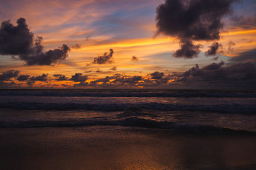 Obraz na płótnie Canvas Magical dramatic sunset on a tropical beach.
