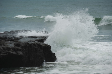 Beach and beautiful views of the cliffs, splashing waves and nature.