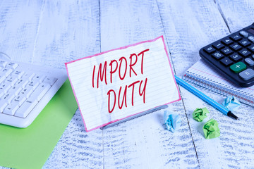 Handwriting text Import Duty. Conceptual photo tax imposed by a government on goods from other...