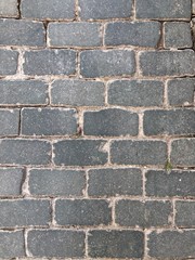 Vertical gray stone brick texture floor wall background