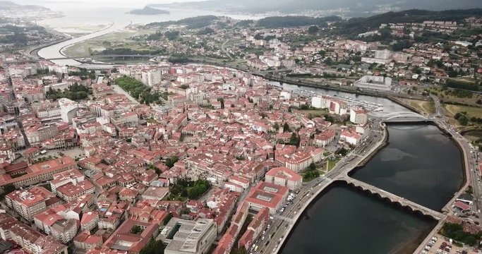 Panoramic view from drone on the city center Pontevedra with embankment of the river Rio Lerez. Galicia. Spain
