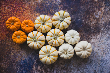pumpkins on stone background