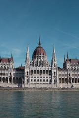 Fototapeta na wymiar Budapest Parliament Building in the afternoon against a clear blue sky