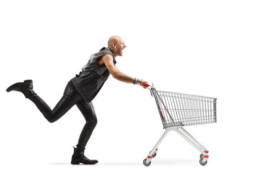 Punk running with an empty shopping cart