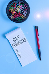 Conceptual hand writing showing Get Organized. Concept meaning arranged according to a particular...