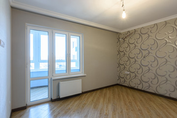 Exit to a glazed loggia in the interior of an empty room