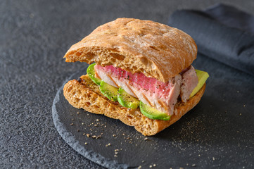 Sandwich with tuna and avocado