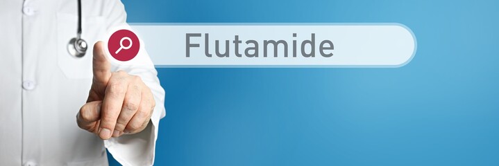 Flutamide. Doctor in smock points with his finger to a search box. The word Flutamide is in focus. Symbol for illness, health, medicine