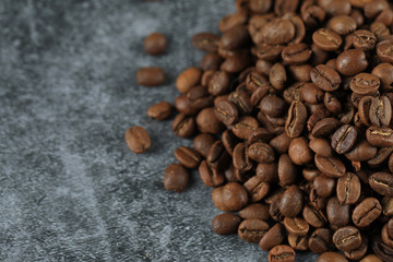 Fresh coffee beans for wholesale, on the right side of the background