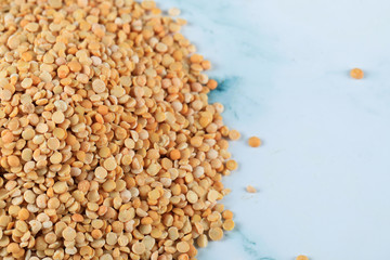 Yellow beans stock isolated on the blue marble