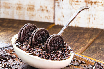 brazilian easter egg. Easter with refined chocolate, covered with sprinkles. Black and white chocolate and chocolate chip cookie with sprinkles.