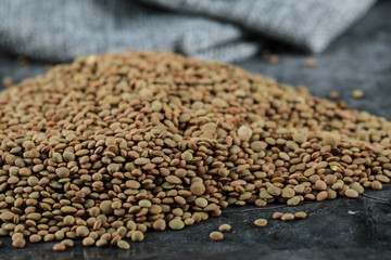 Green fresh and healthy lentil in the center of the background