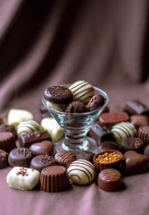 Chocolate still life on brown silk