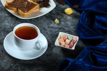 A cup of tea with traditional turkish delight