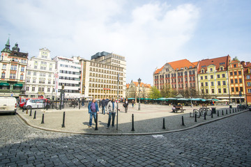 The Market Square in the city center of Wrocław city in Poland. in the picture you see the old colorful buildings and the Old town hall building