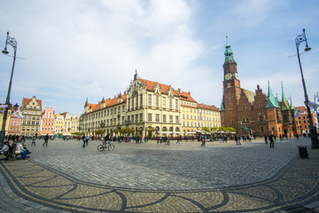 The Market Square in the city center of Wrocław city in Poland. in the picture you see the old colorful buildings and the Old town hall building