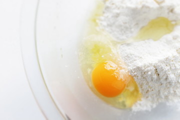 flour and egg with butter for pan cake cooking
