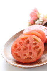 Chopped tomato on dish for prepared food image