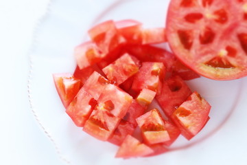 Chopped tomato on dish for prepared food image