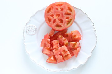 Chopped tomato on dish for prepared food image