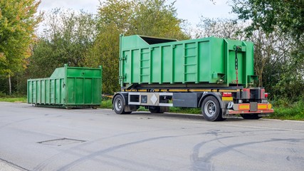 Green skip (dumpster) for municipal waste  . Utilities do their job