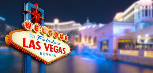 Welcome to Never Sleep city Las Vegas, Nevada Sign with the heart of Las Vegas scene in blur...