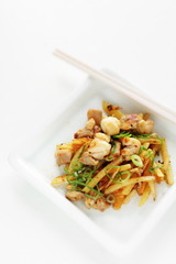 Korean food, potato and chicken stir fried with Kimchi