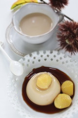 Homemade sweet food, chestnut and pudding with caramel sauce
