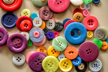 Many colorful garment buttons in various shapes and sizes