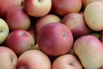 Apples on the market. Fresh organic red apples from the local farmers market. Apples background background texture seasoning Apples for sale. 