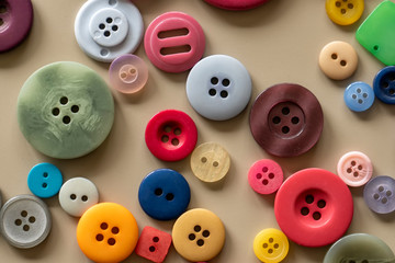 Many colorful garment buttons in various shapes and sizes