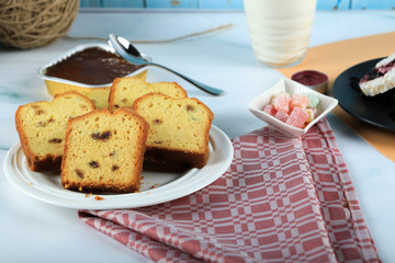 Sliced berry pie in a white saucer
