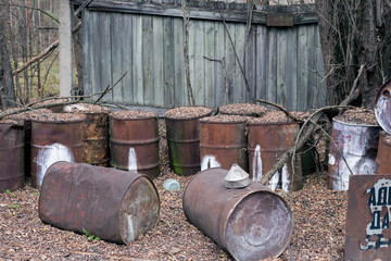 Old rusty barrels in Pripyat in Chernobyl