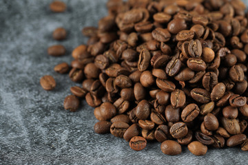 Fresh coffee beans for wholesale, on the right corner of the background