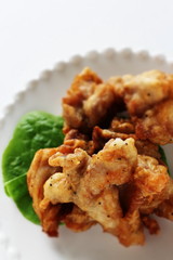 Asian food, fried chicken on dish with copy space
