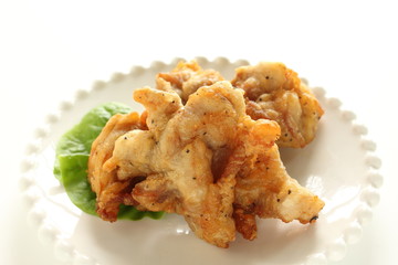 Asian food, fried chicken on dish with copy space