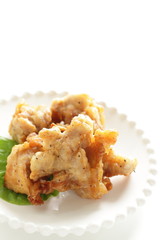 Asian food, fried chicken on dish with copy space