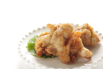 Asian food, fried chicken on dish with copy space