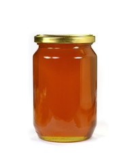 Honey jar on white background. Jar with organic honey. 
