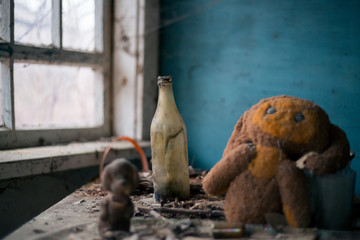Soft toy doll in an abandoned school in Pripyat in Chernobyl