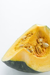 Quarter cut pumpkin on dish for food ingredient